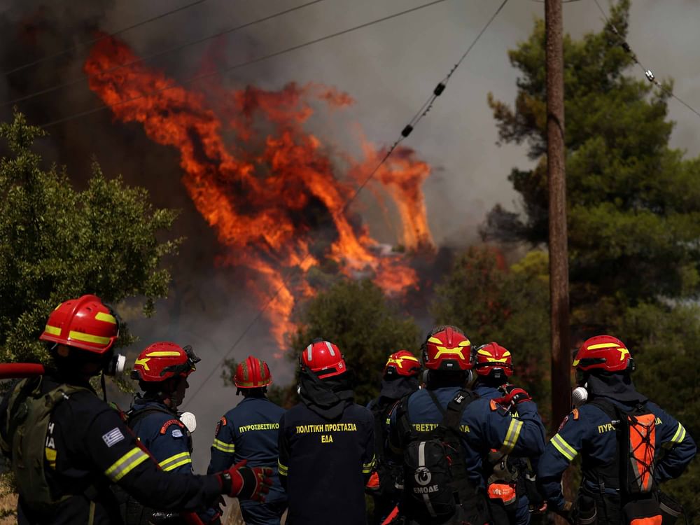 Two helicopters collide while battling major wildfire near Athens