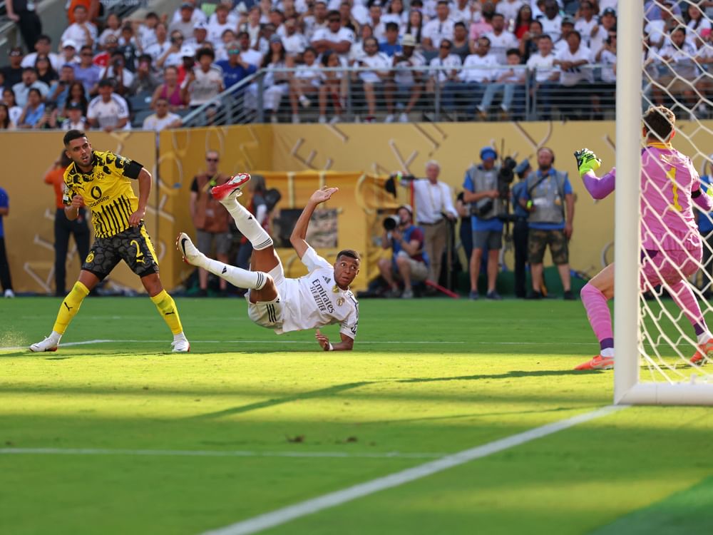 Real Madrid survive Dortmund scare to reach Club World Cup semis