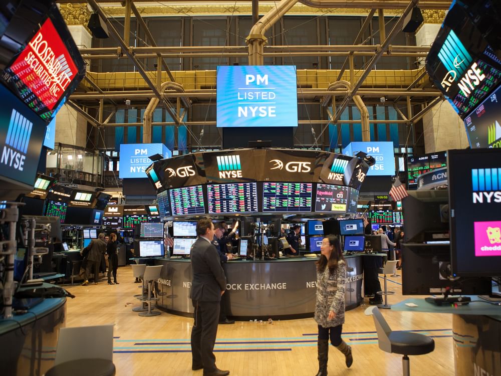 Wall Street closes higher as major indices post gains