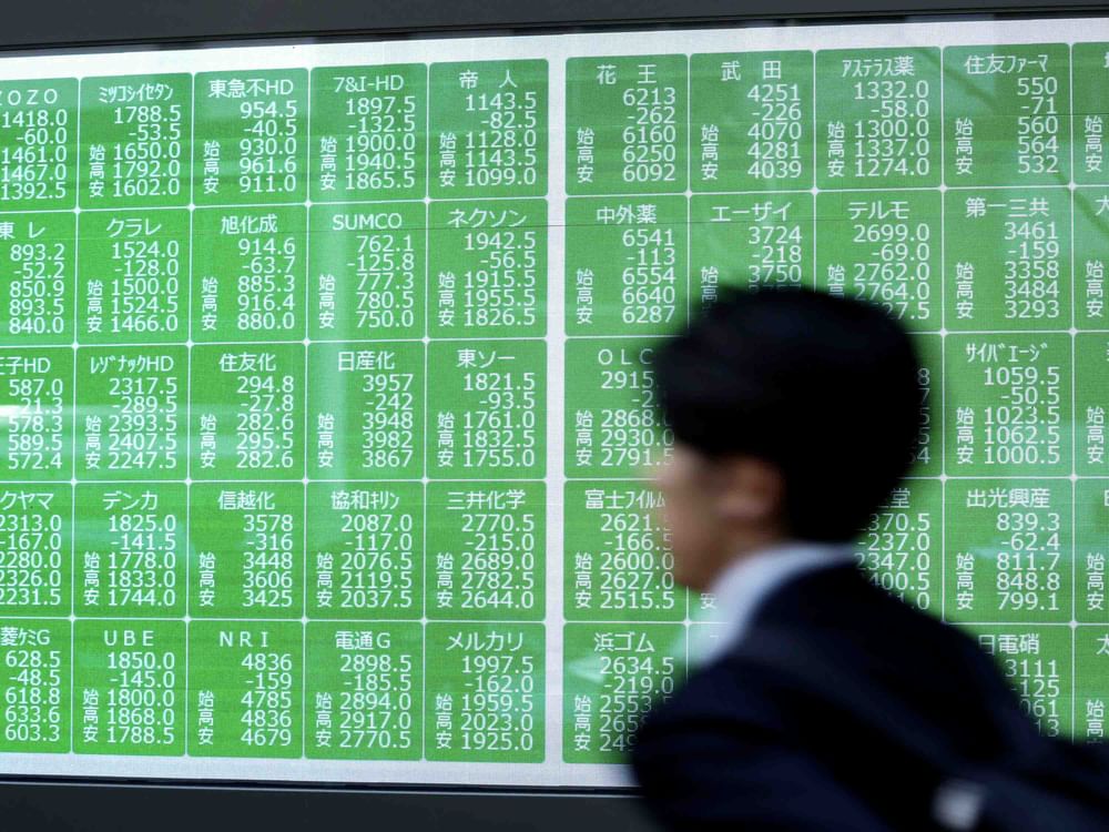 Tech stocks push Nikkei to record high