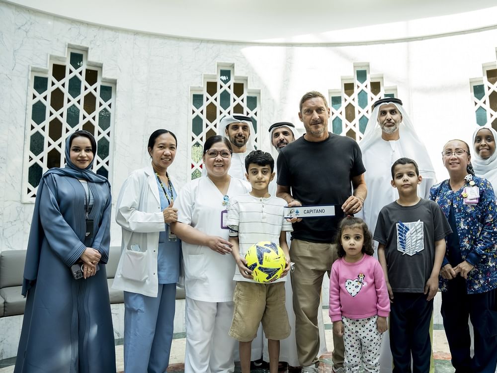 Italian Football legend Totti brings a smile to young football fans at PureHealth’s SKMC