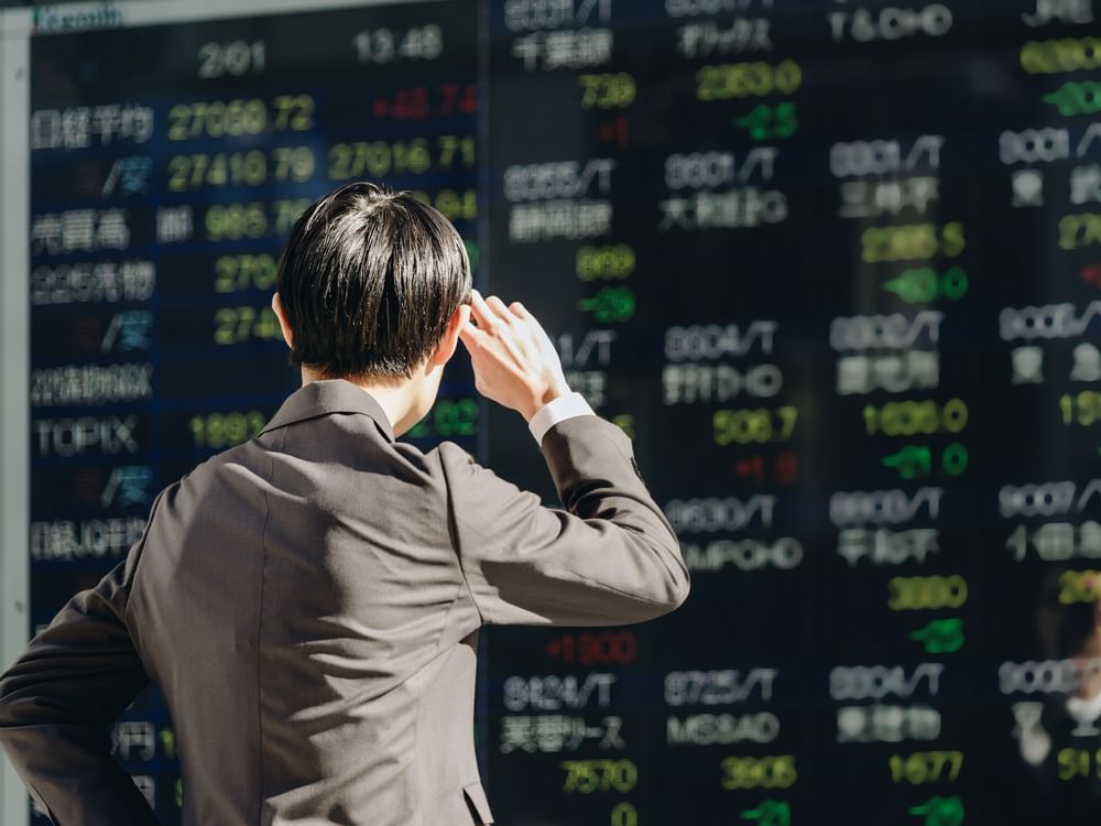Japan’s Nikkei slumps, yen trades above 160 per dollar