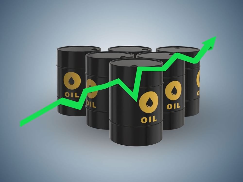 Oil prices settle slightly higher