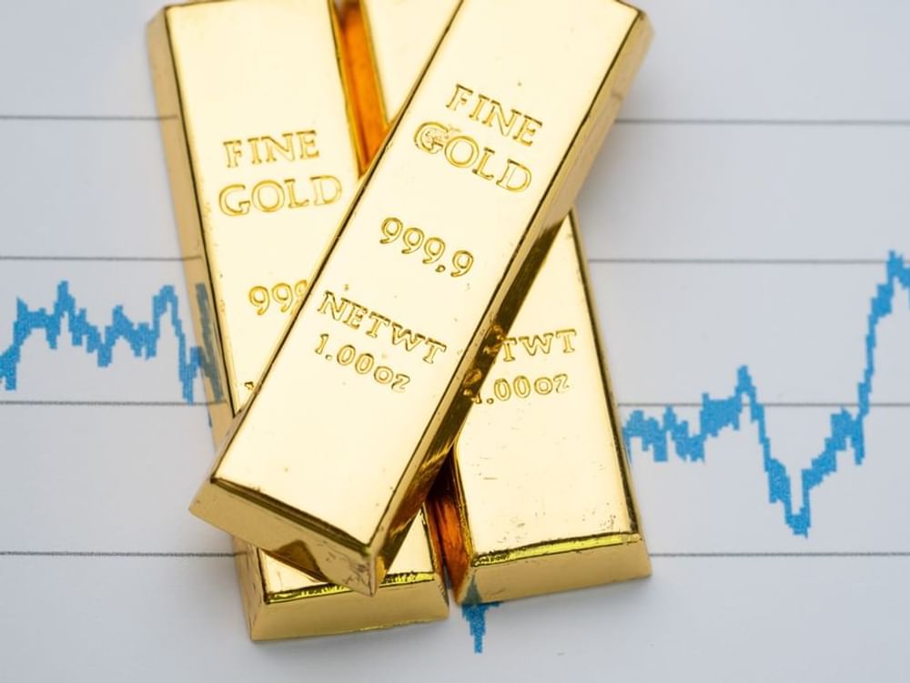 Gold softens on prospects of Fed rate hikes as Brent tops $100