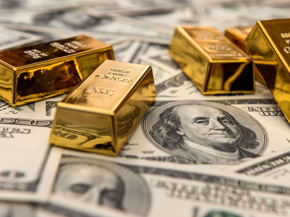 Gold prices rise amid softer US dollar, lower oil prices