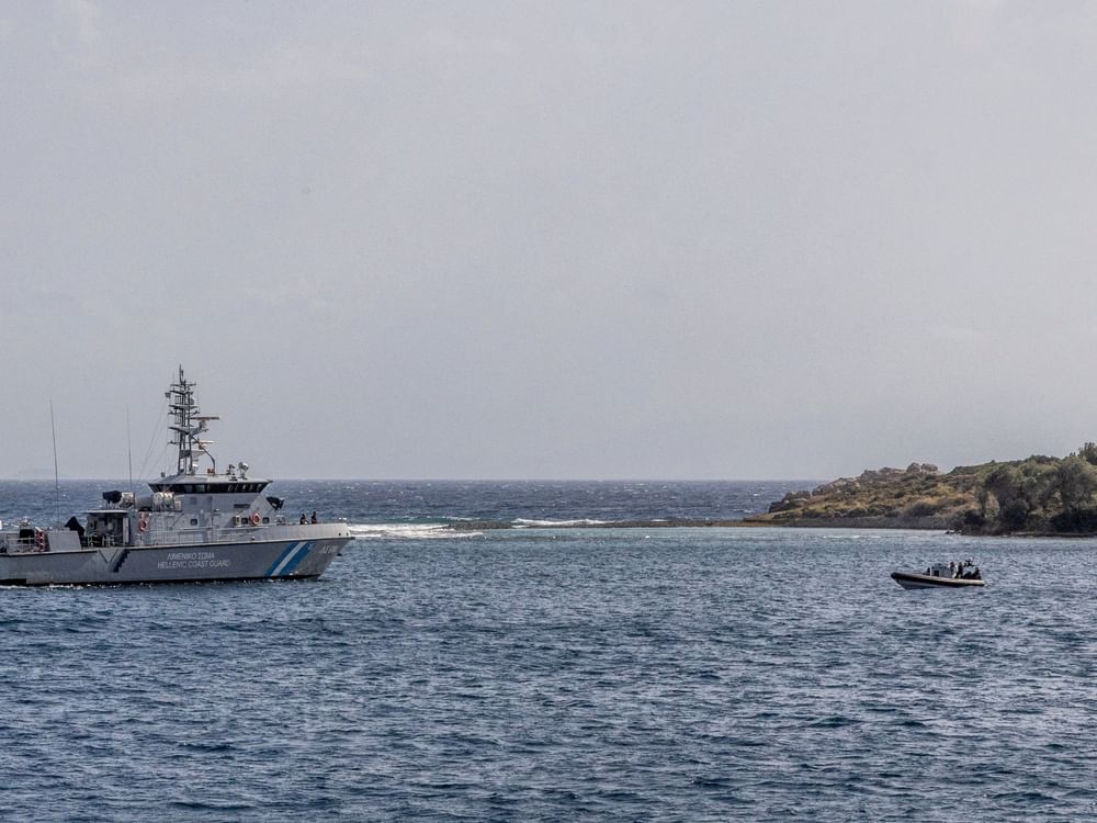 52 migrants rescued, child missing off Greek coast