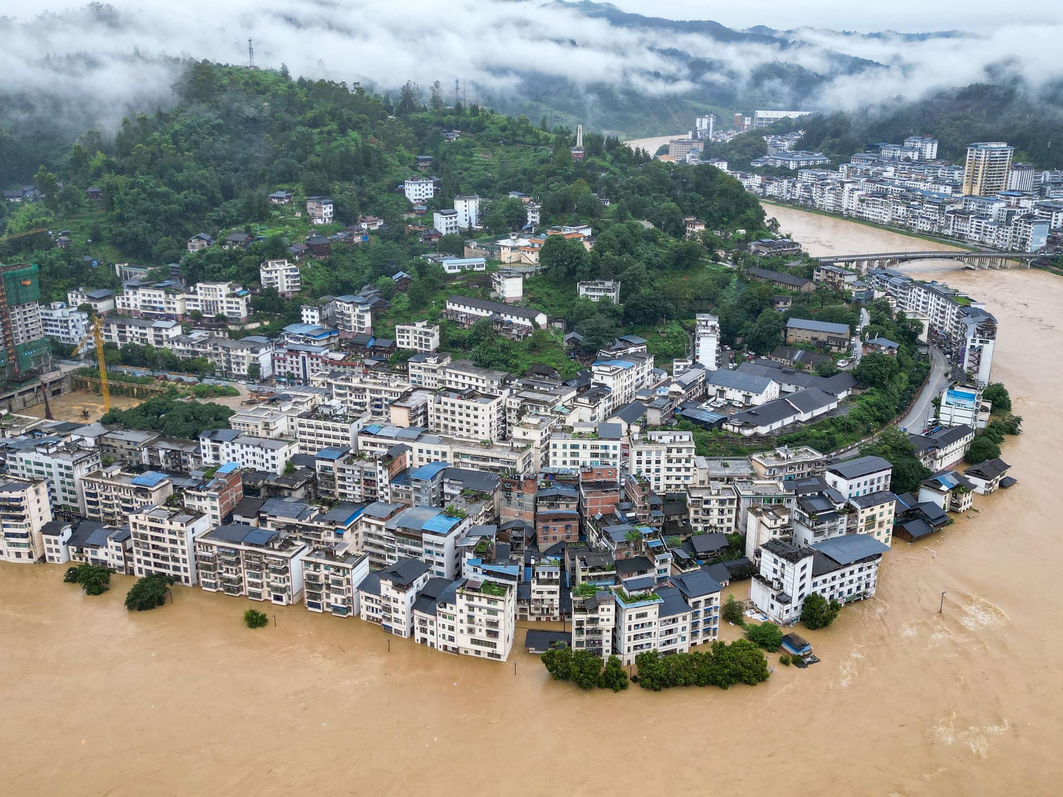 China activates emergency response to flooding in Chongqing, Guizhou