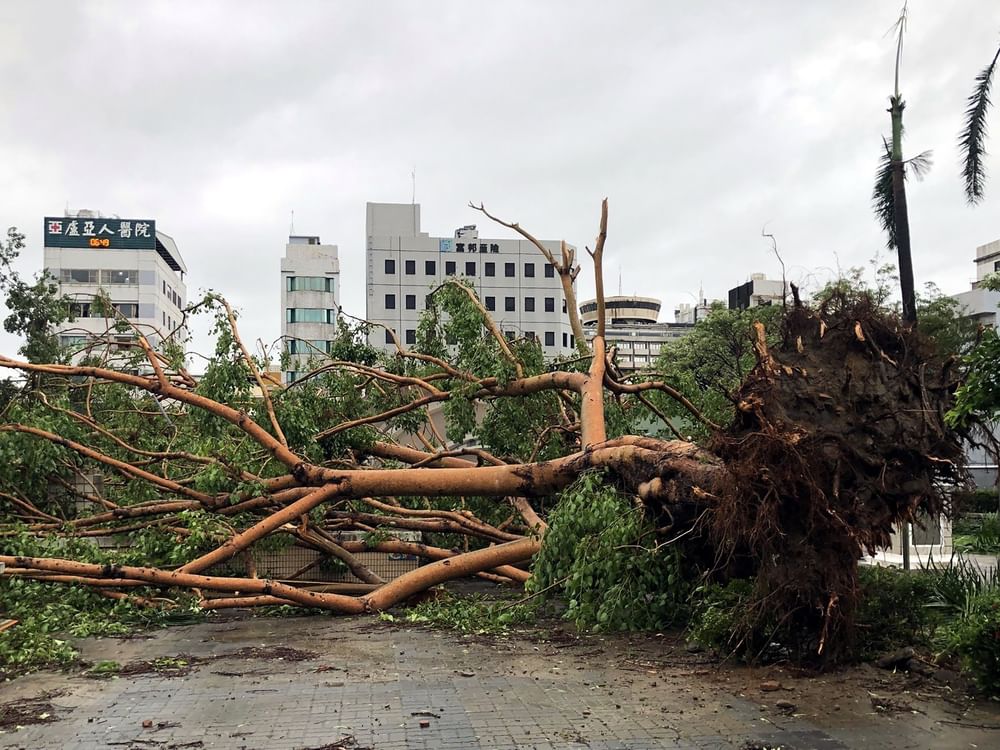 Typhoon Danas lashes southern Taiwan with record winds, injuring hundreds