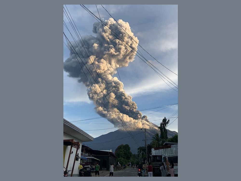 Philippine volcano spews ash plume into sky, prompting school closures