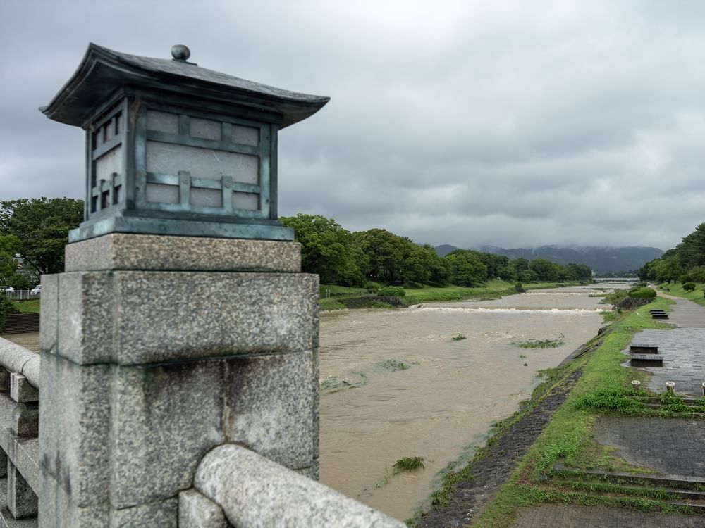 Heavy rain pounds western Japan as 2 tropical storms approach