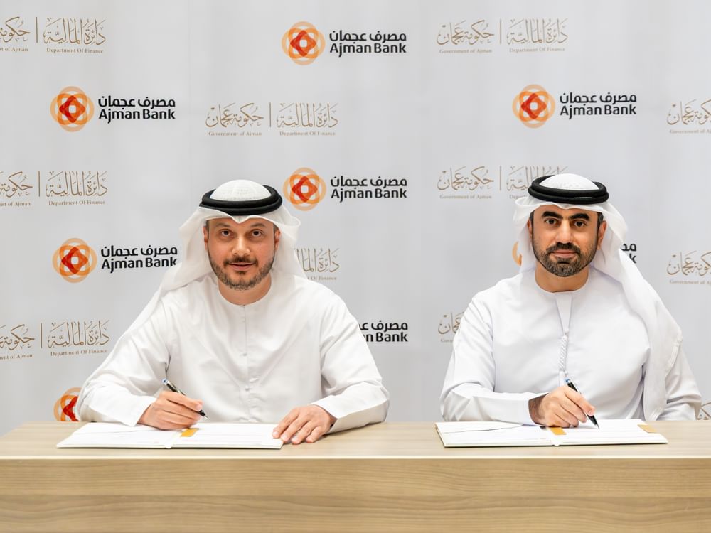 Ajman Department of Finance, Ajman Bank sign agreement to boost operational efficiency