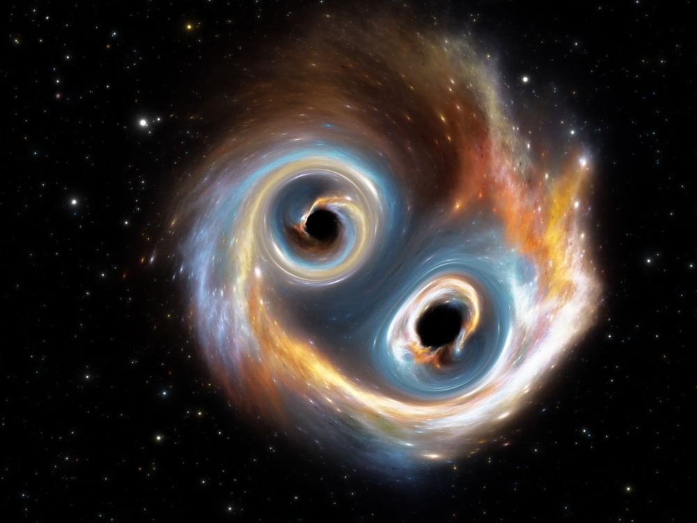 Astronomers capture first-ever image of two black holes orbiting each other