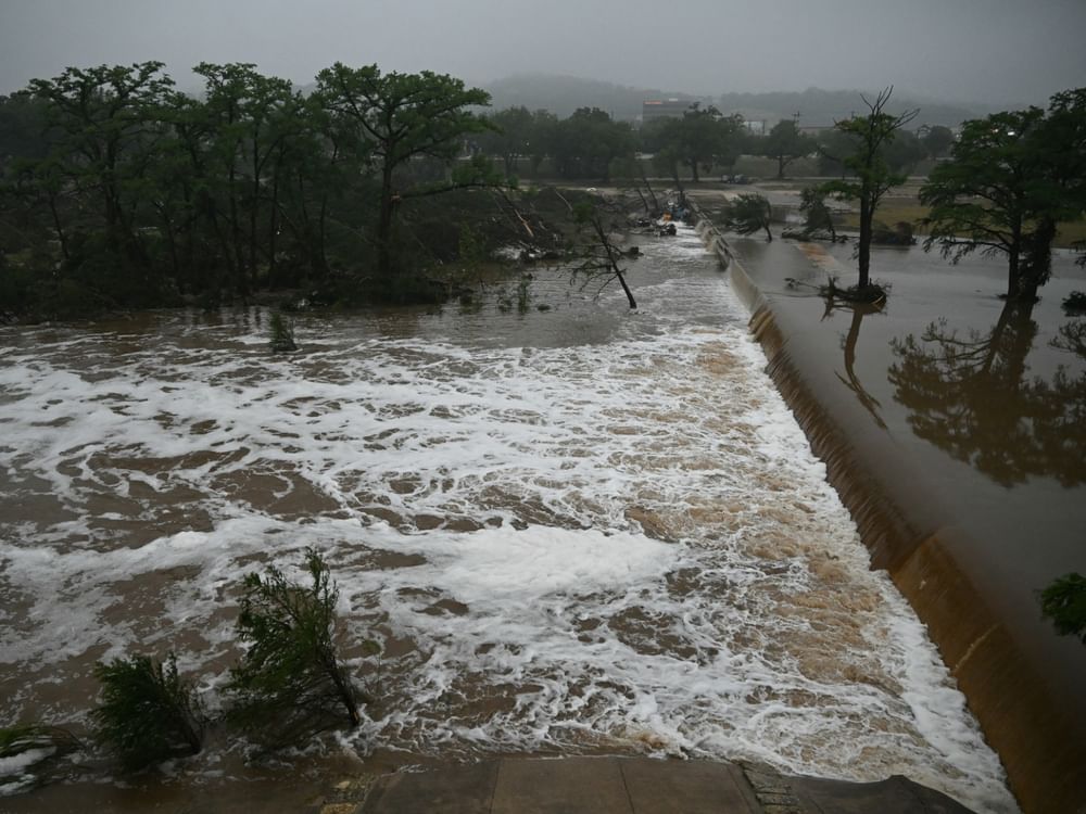 Death toll in Texas floods rises to at least 27 as search continues for many missing
