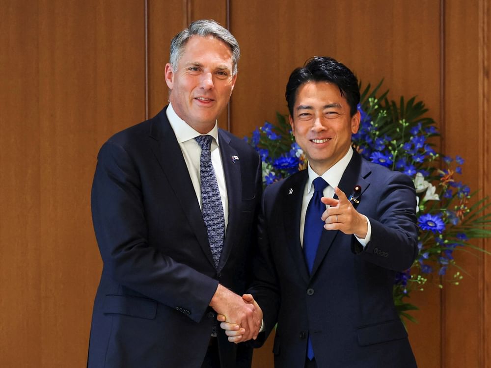 Australia, Japan sign AU$10 billion warship deal