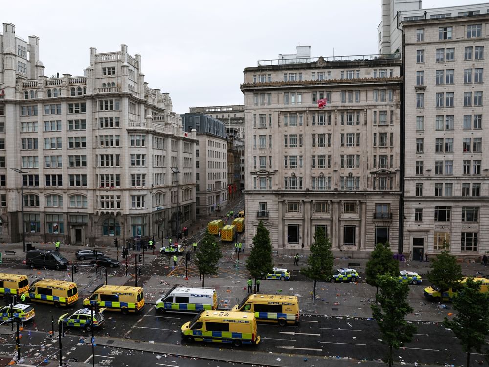 Man detained after car crashes into people following Liverpool parade