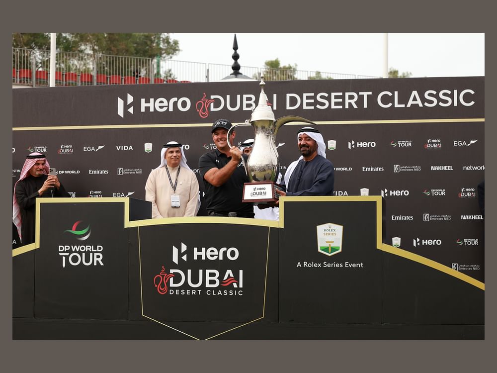 Ahmed bin Saeed presents Patrick Reed Hero Dubai Desert Classic trophy after thrilling victory